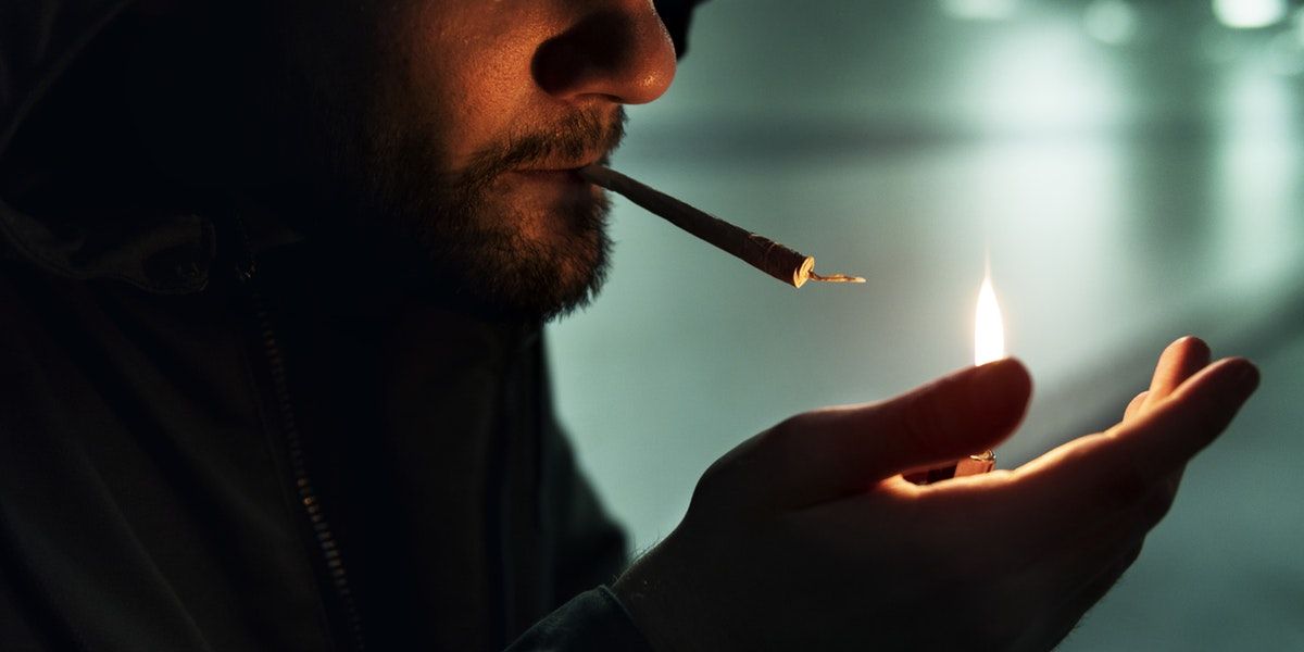 Cannabis Counterculture man smoking joint