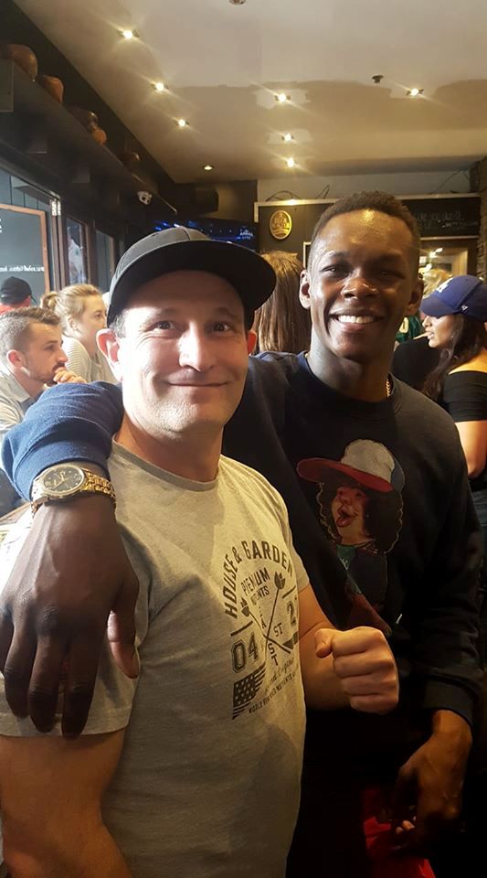 Israel Adesanya with Arik Reiss